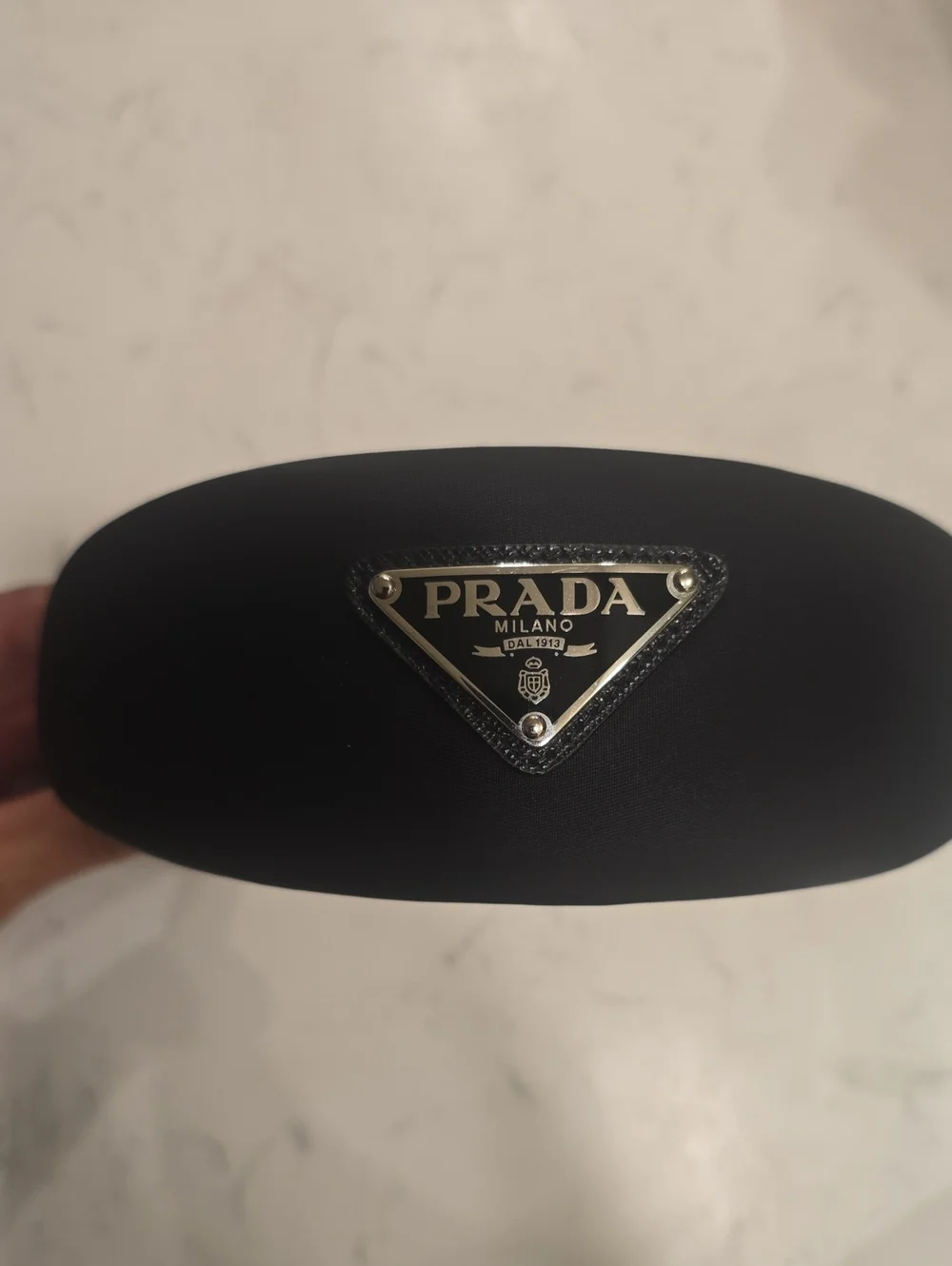Prada Black Headband with Silver Triangular Logo
